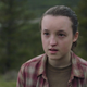 Bella Ramsey as Ellie stares intently at Joel (offscreen) in a moment from The Last of Us.